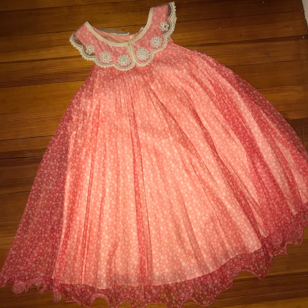 Peach polka dotted dress with pearl detail